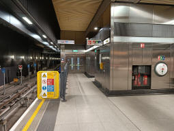 Access to the lift ahead from the end of platform 1