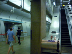 Looking towards the access to the DLR Stratford International branch platforms from the bottom of the escalators from the Jubilee line platforms