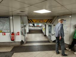 Looking towards the stairs up to the District and Circle line westbound platform from near the top of the escalator up from the Northern line northbound platform