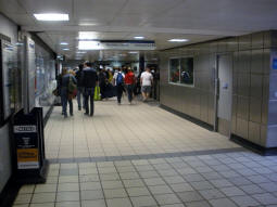 Looking into the ticket hall coming from the Overground and neighbouring mainline platforms