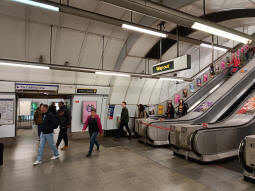 Escalators up to the way out from the interchange level