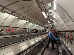 Looking down the escalators to the Piccadilly line