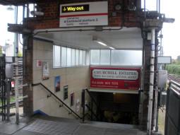 The stairs down to the ticket hall from the westbound island platform