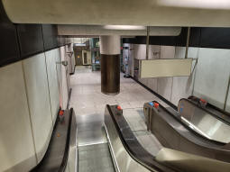 At the bottom of the escalators from the Elizabeth line platforms heading to the Bakerloo line