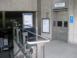 Lift and stairs down to the ticket hall from the entrance
