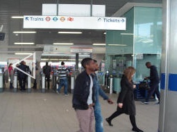 Inside new mezzanine entrance with direct access to Central line westbound on the right and other platforms off to left