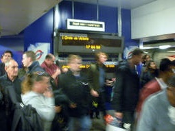 Westbound departure boards at the exit from the island platform