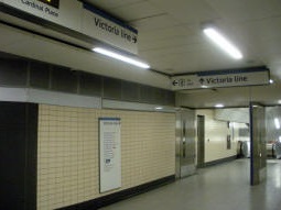 At the top of the lift and escalators from the Victoria line for the Cardinal Place exit