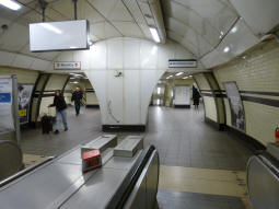 At the bottom of the escalators to the Northern line