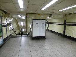 Coming from the Northern line escalators: Left to go straight onto the northbound platform, right to pass over it to reach the southbound