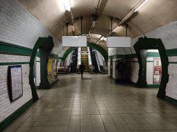 Escalators and stairs to the ticket hall from between the platforms