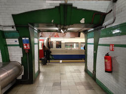 Looking through to the southbound platform from by the escalators and stairs up to the ticket hall