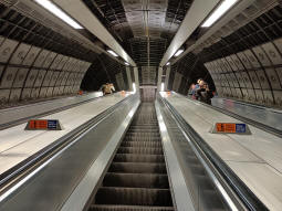 Looking up one of the sets of escalators from the Jubilee line platforms to the interchange level