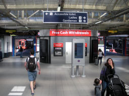 Entrances to the District line platforms from the stairs to the overbridge and exits