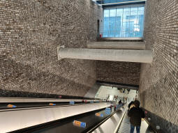 Looking down the escalators to the platforms from the ticket hall